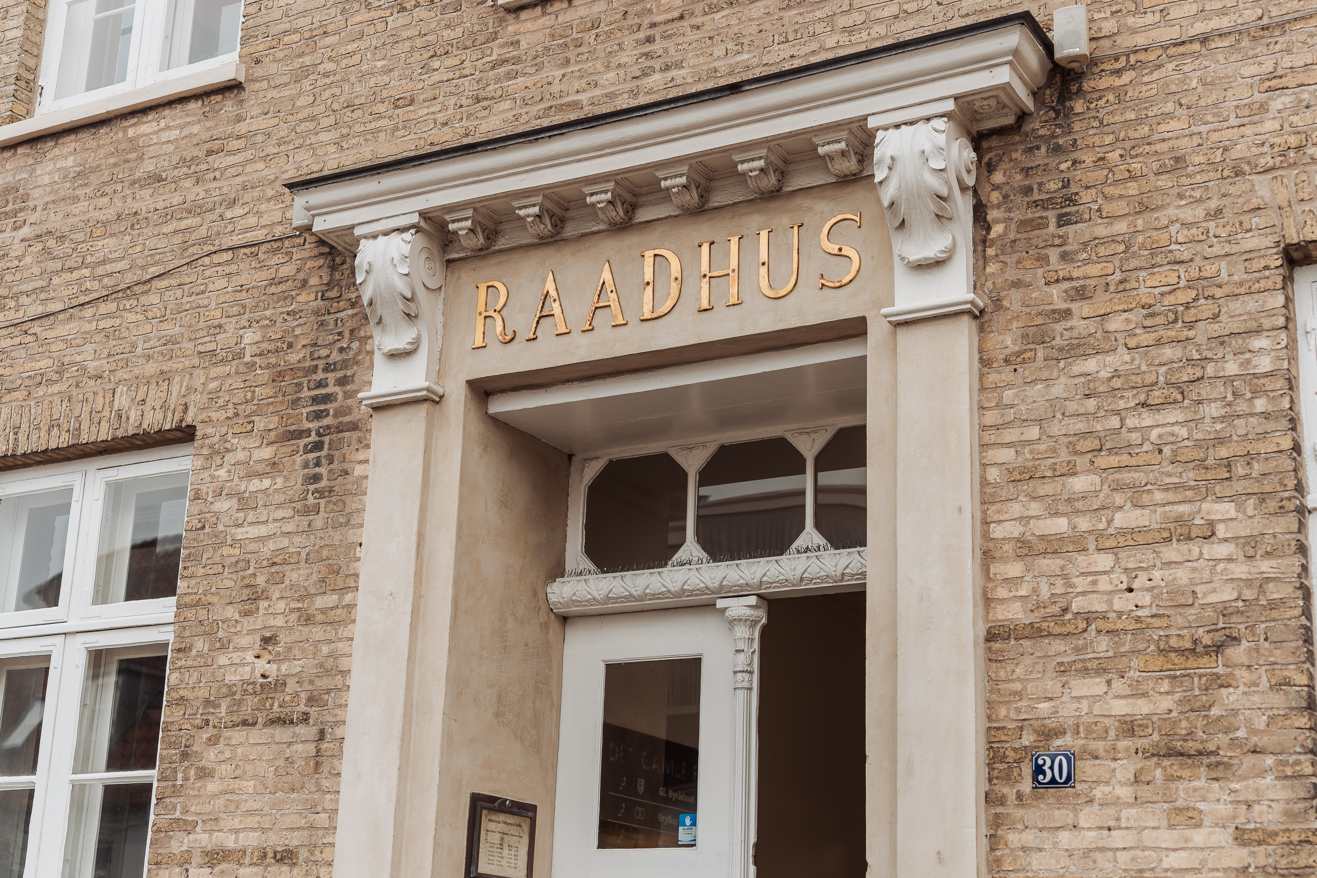 Elegant entrance to Aabenraa Town Hall, perfect for intimate civil wedding ceremonies in Denmark.