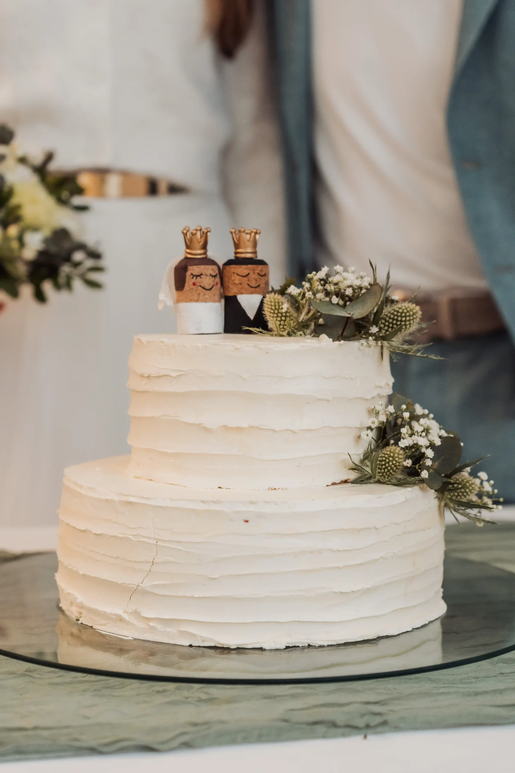 Another close-up of the wedding cake, highlighting its intricate details and stunning decoration, making it a beautiful focal point of the celebration.