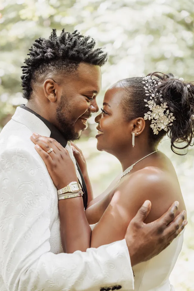 couple smiling with their faces close together after their court wedding