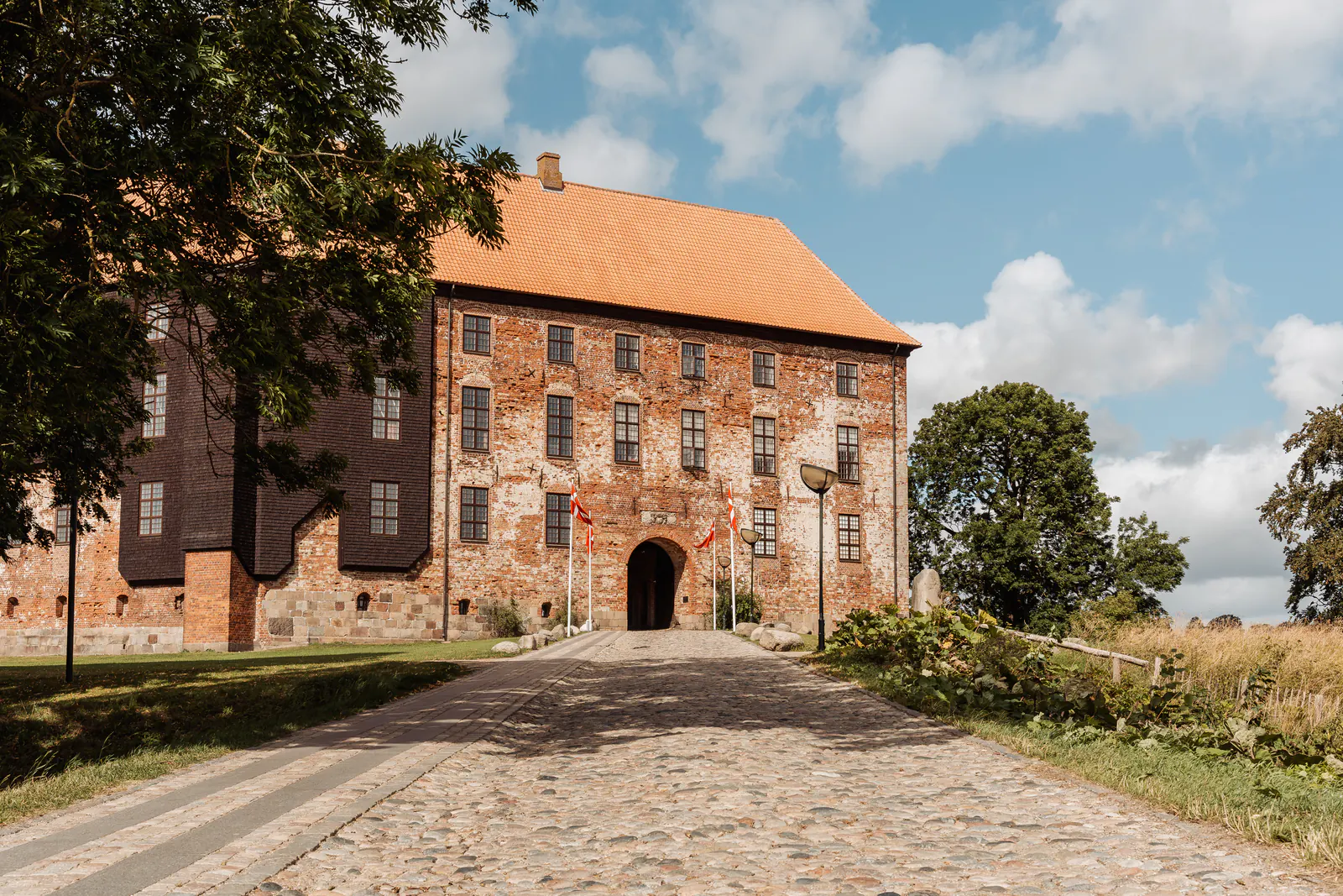Koldinghus castle at the top of its cobbled approach in Kolding